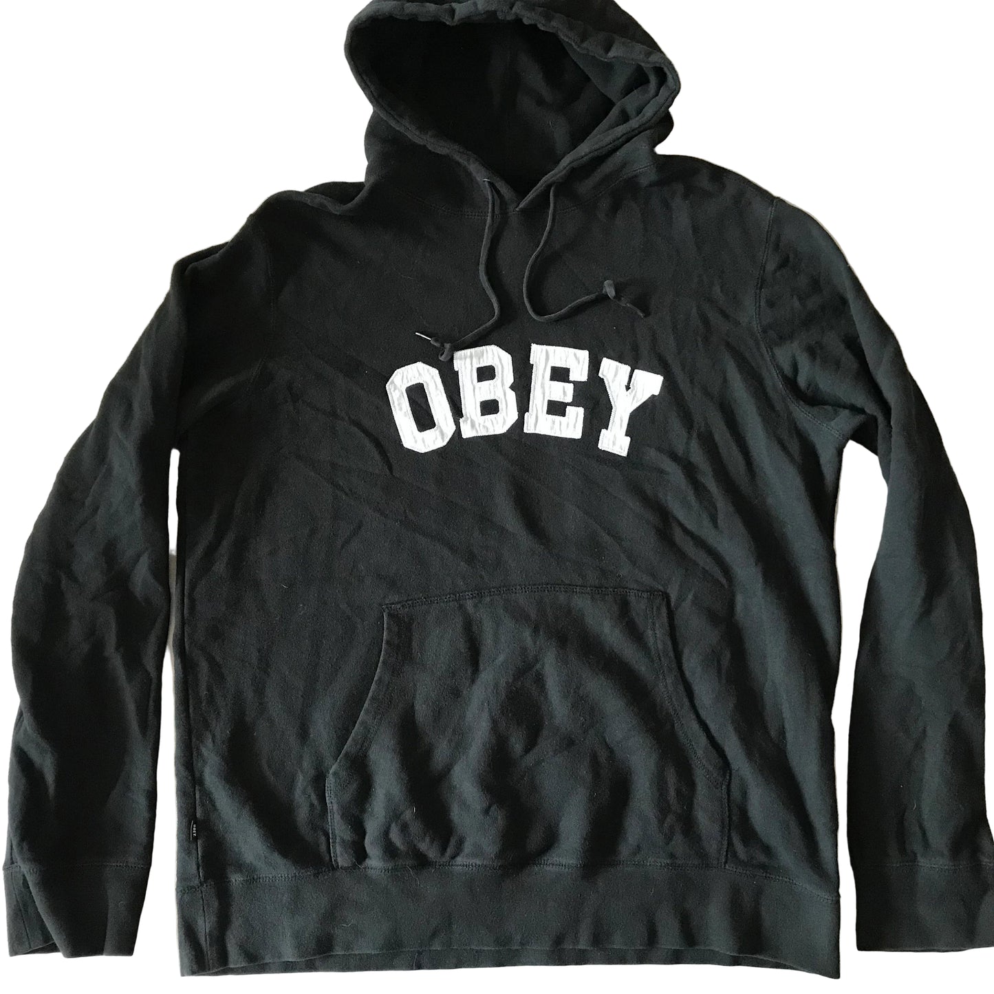 Black hoodie with 'OBEY' logo on a white background