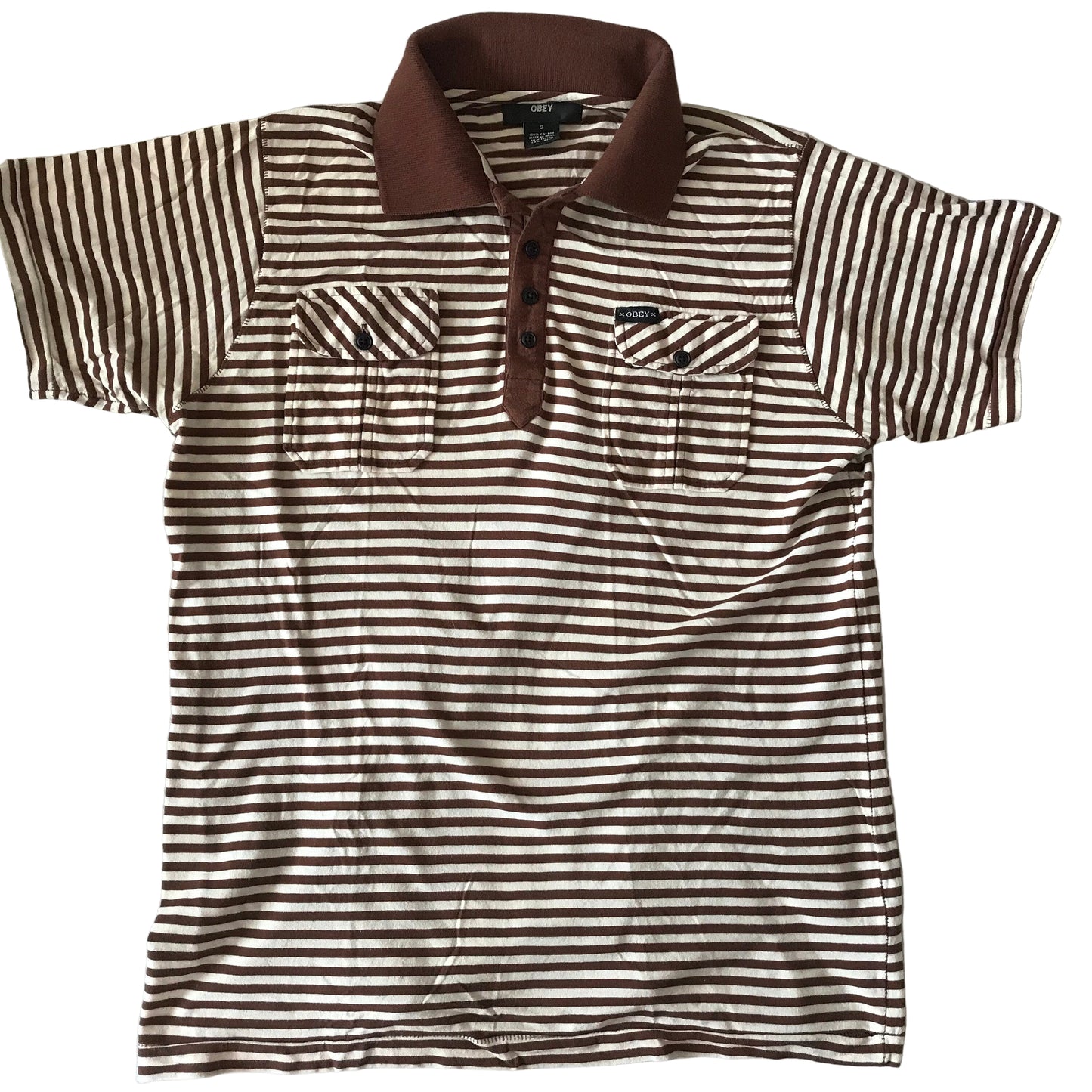 Brown and white striped polo shirt on a light gray surface