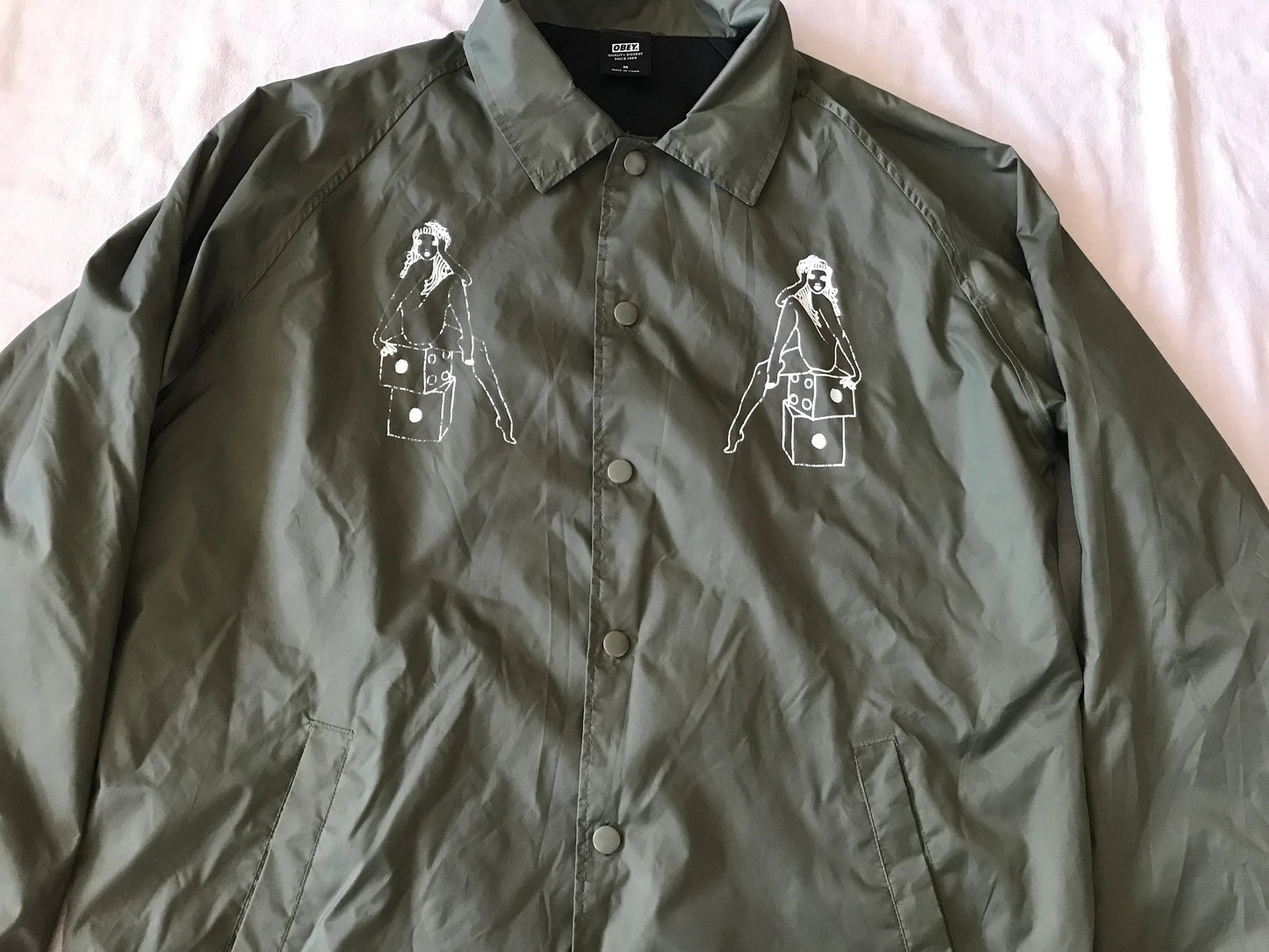 OBEY CLOTHING ''OBEY WORDWIDE'' MEN'S  WINDBREAKER LIGHT JACKET OVERSHIRT SNAP BUTTONS DRAB W/ GRAPHIC PRINT MEDIUM