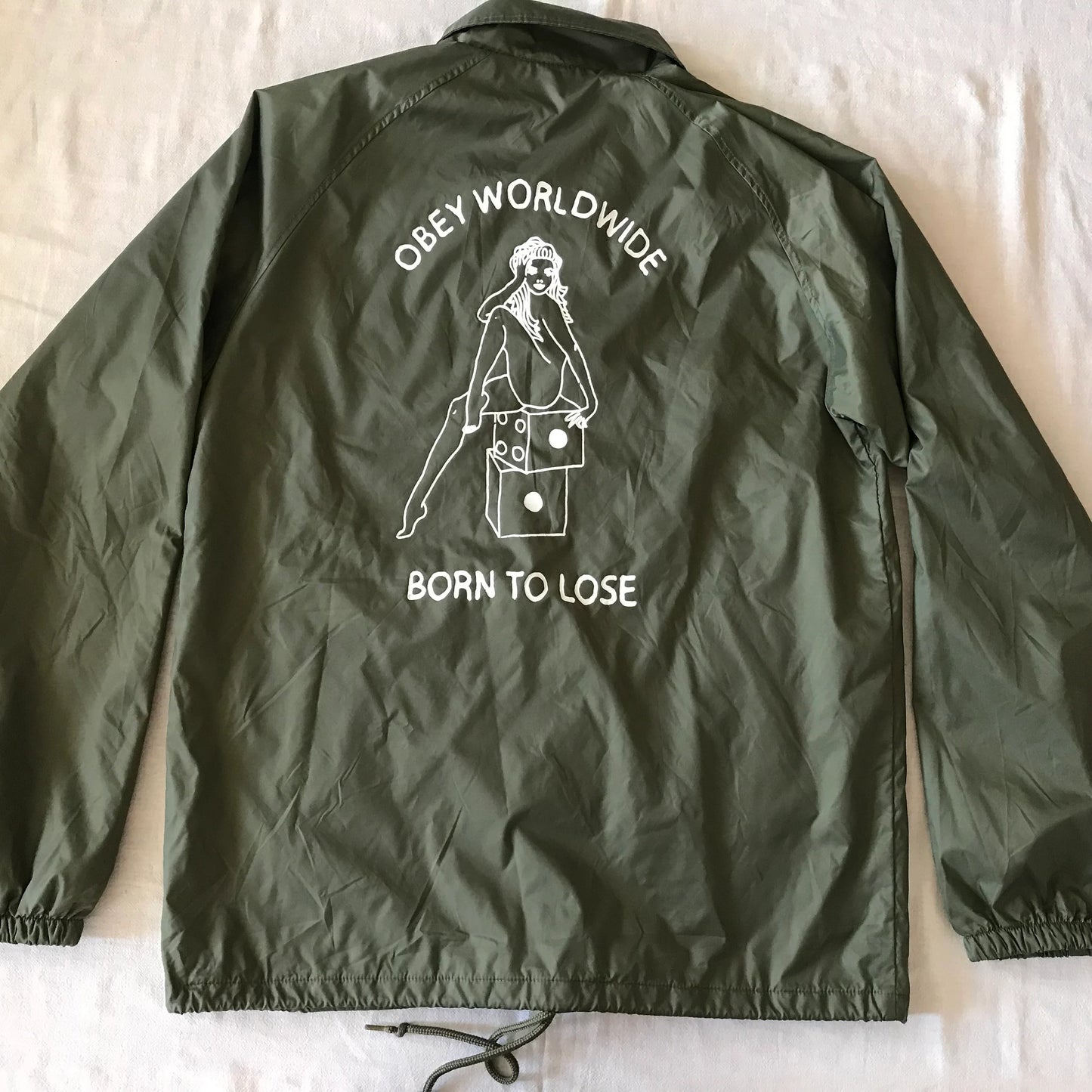 OBEY CLOTHING ''OBEY WORDWIDE'' MEN'S  WINDBREAKER LIGHT JACKET OVERSHIRT SNAP BUTTONS DRAB W/ GRAPHIC PRINT MEDIUM